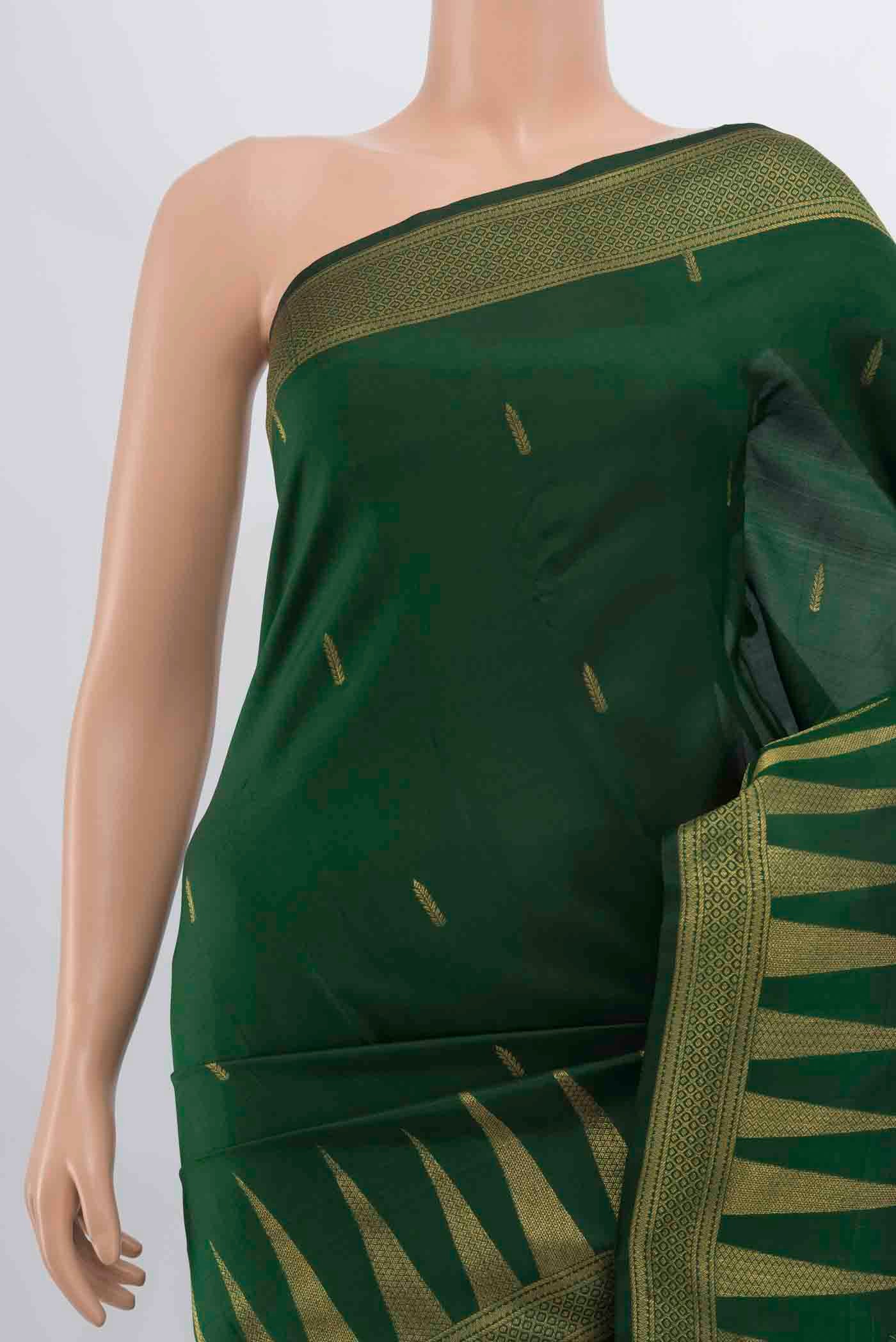 Border image of Bottle Green Kanchipuram Silk Saree with Zari Butta on the body and Temple Border