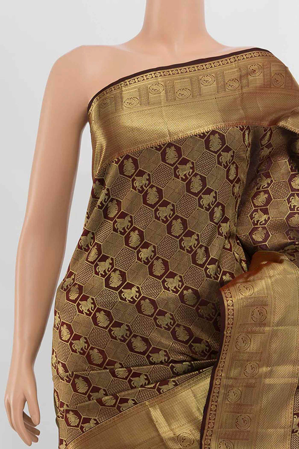 Border image of Maroon Kanchipuram Silk Saree with Zari Butta on the body and Silk Border. 