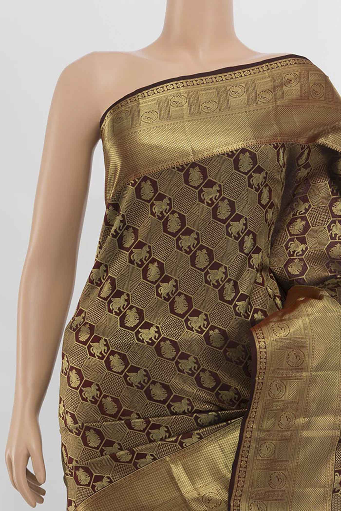 Border image of Maroon Kanchipuram Silk Saree with Zari Butta on the body and Silk Border. 