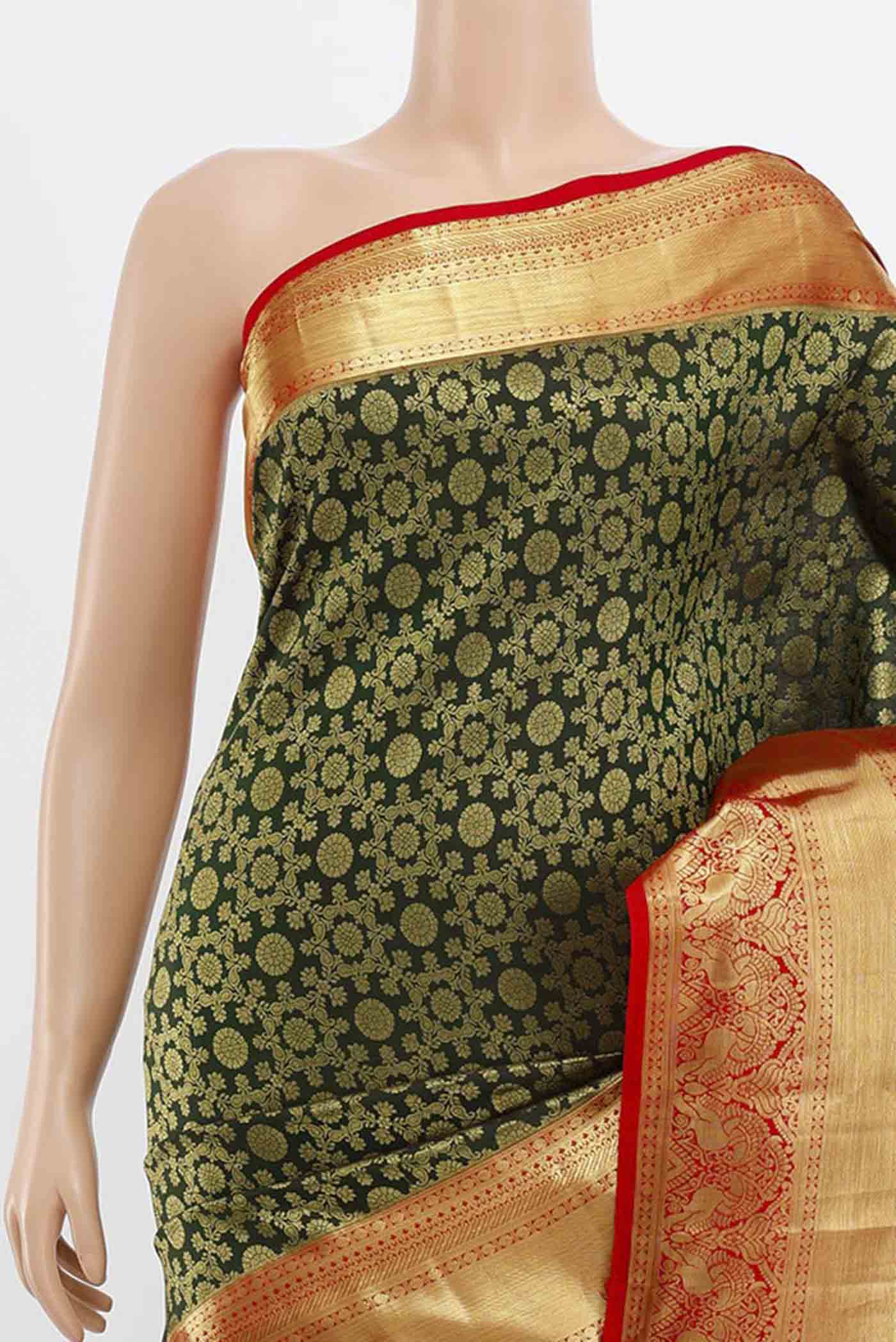 Border image of Bottle Green Kanchipuram Silk Saree with Zari Butta on the body and Silk Border. 