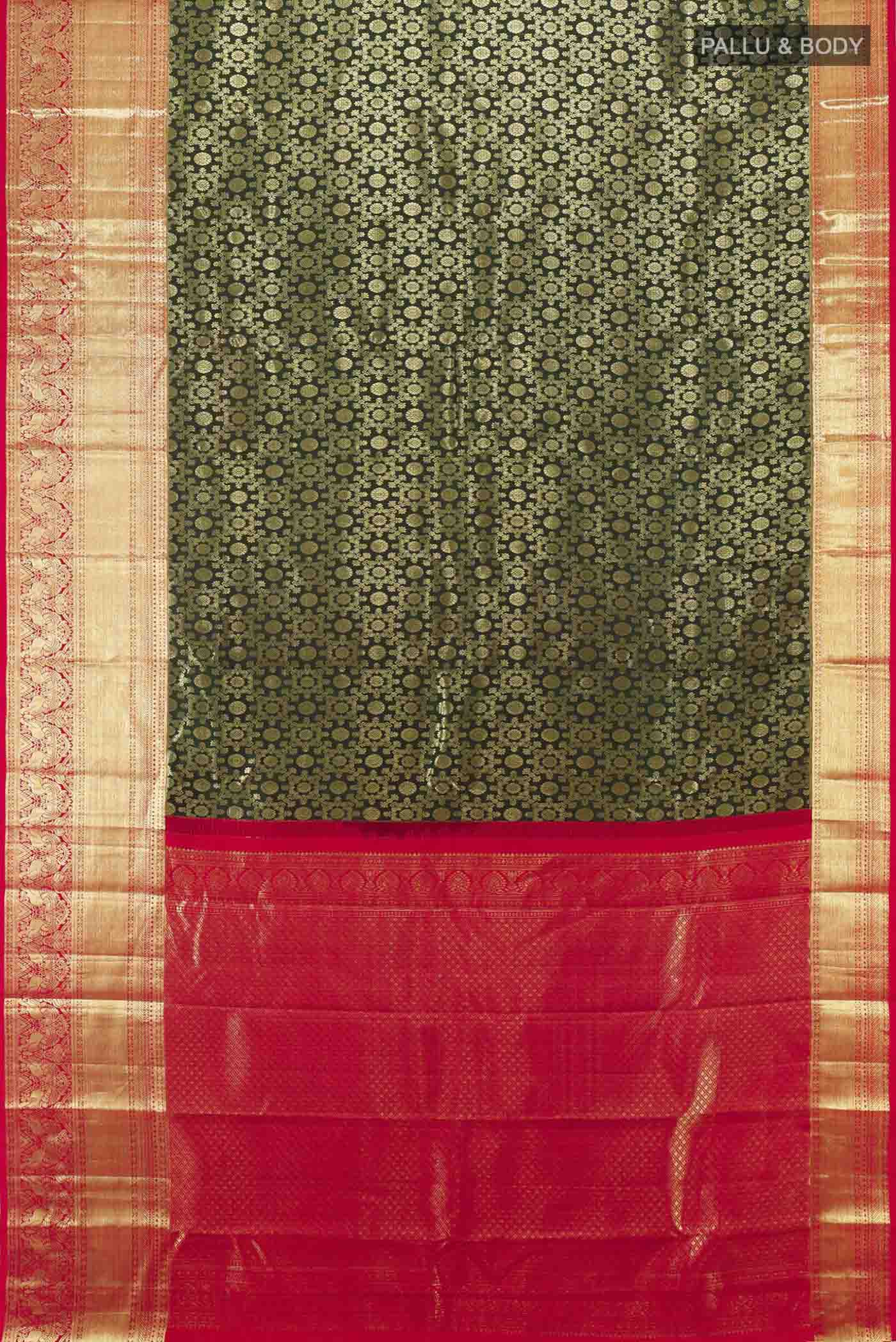 Flat view of Bottle Green Kanchipuram Silk Saree with Zari Butta on the body and Silk Border. 