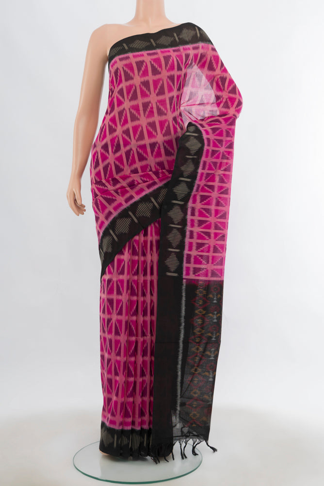 Peach Pochampally Cotton Saree with Ikat Print on the body and Fancy Border.  displayed on a mannequin