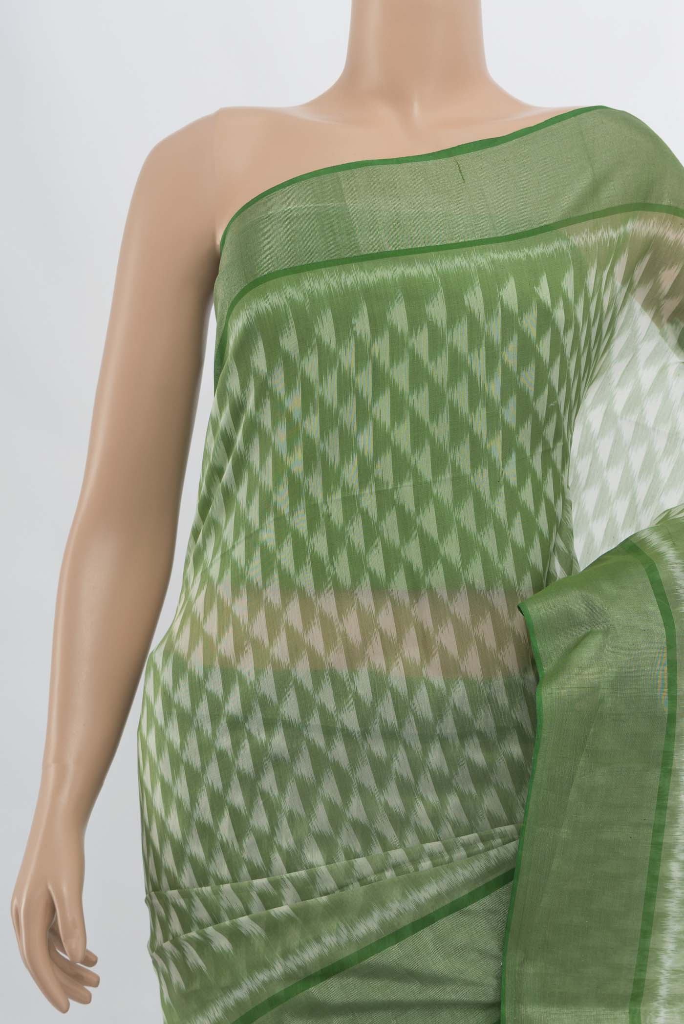 Border image of Light Green Kora Cotton Saree with Zari Butta on the body and Silk Border. 