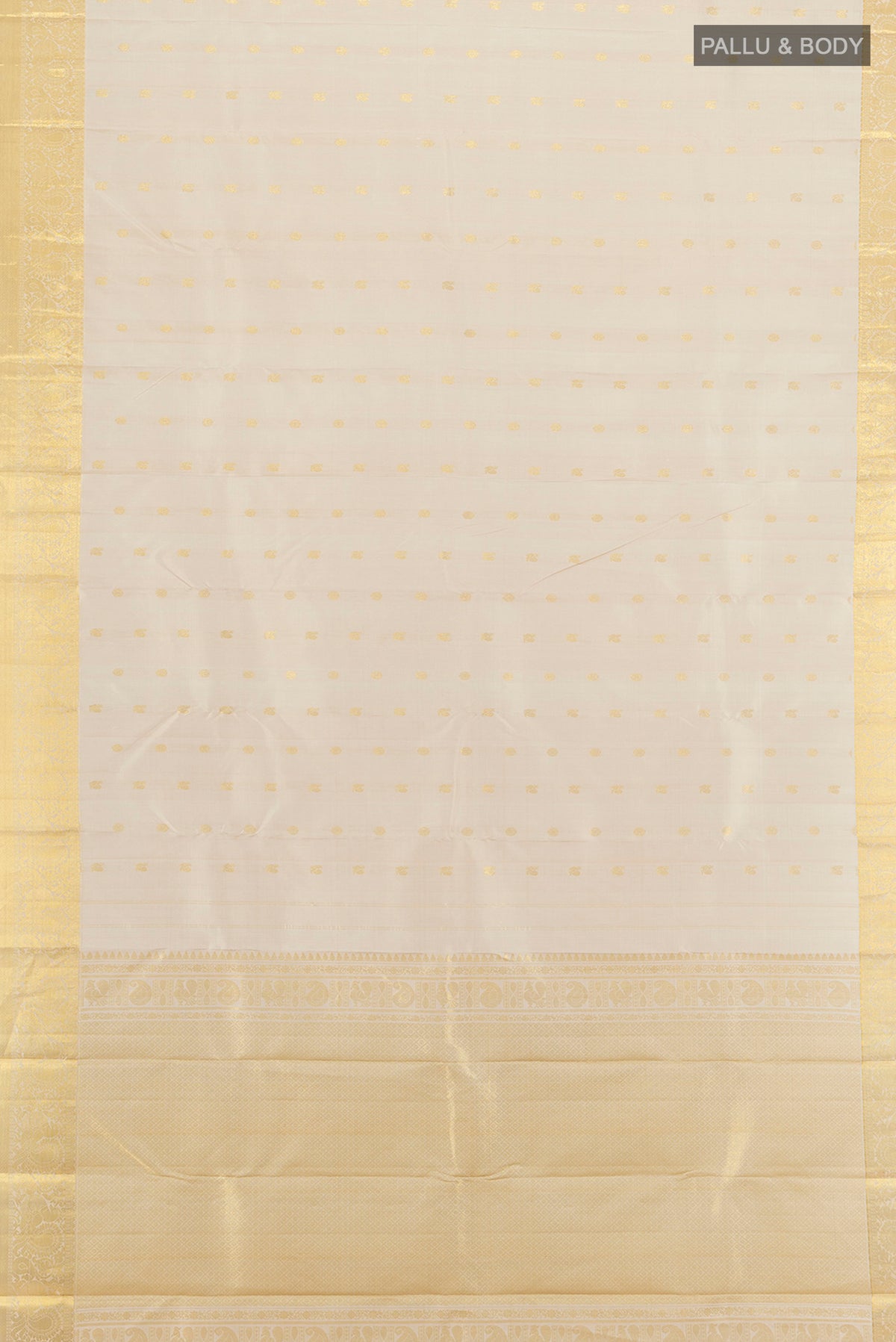 Flat view of Beige Kanchipuram Silk Saree with Zari Butta on the body and Zari Border. 