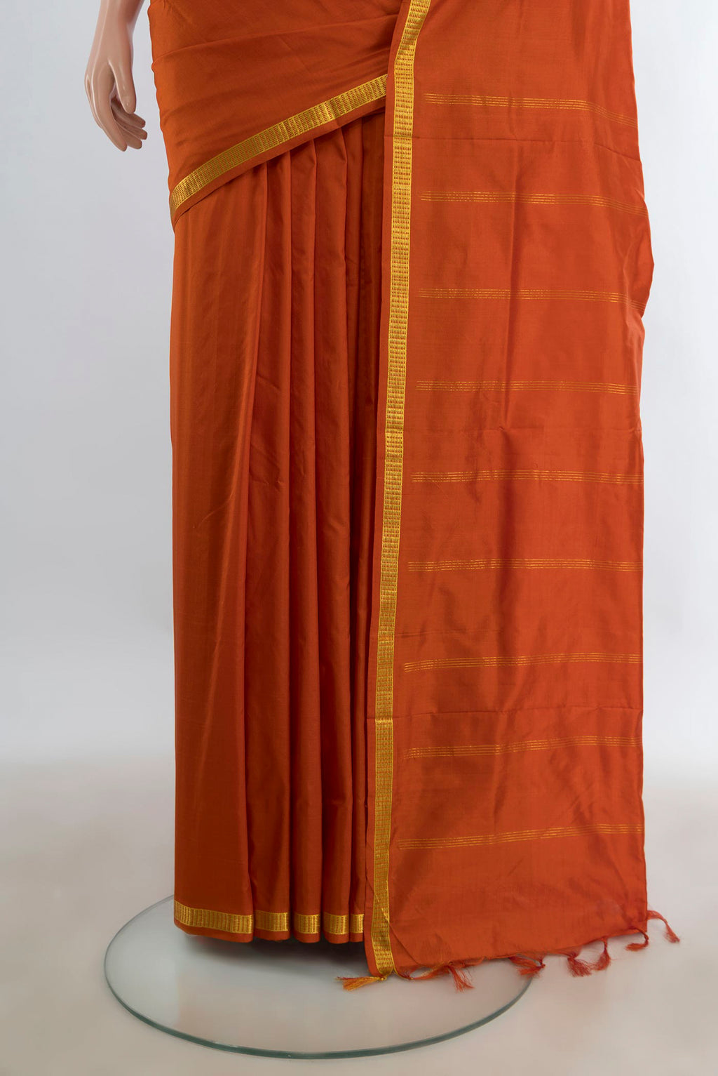 Pleats and pallu of Pure Silk Pure Zari Rust Kanchipuram Nine Yards Saree with Plain Body and Silk Border. 