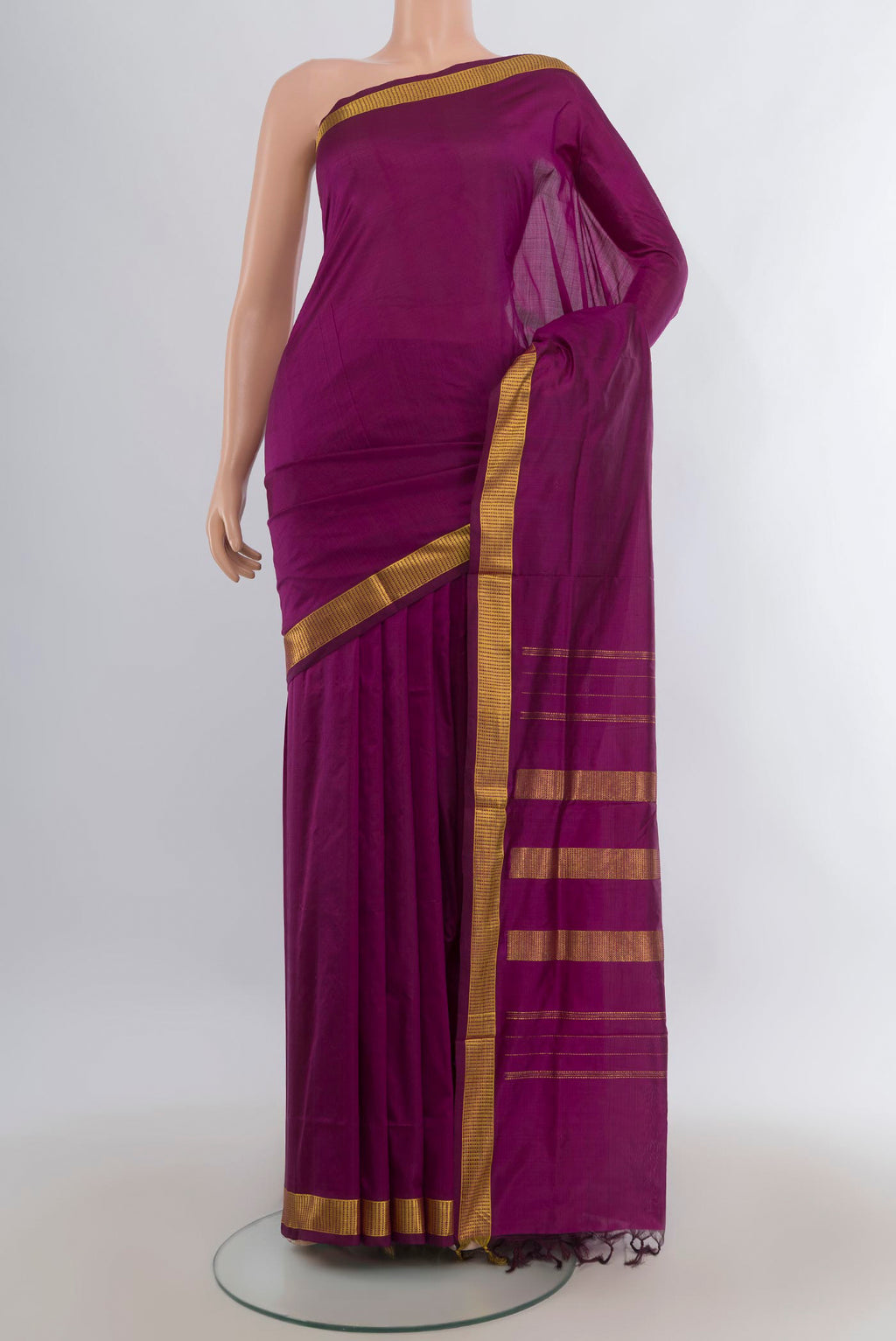 Pure Silk Magenta Kanjivaram Nine Yards Saree with Plain Body and Zari Border.  displayed on a mannequin