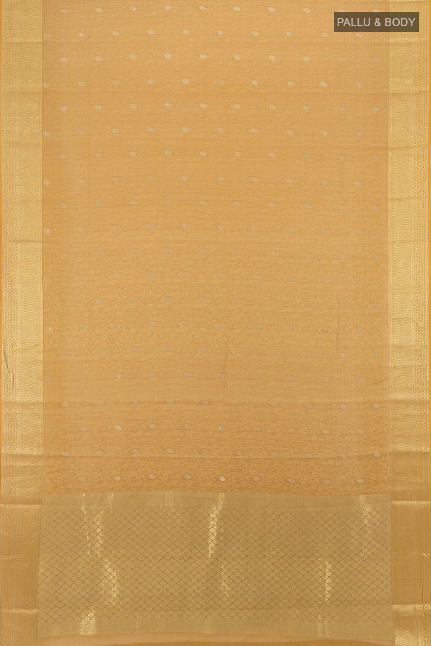 Flat view of Mustard Mysore Crepe Saree with Zari Butta on the body and Silk Border. 