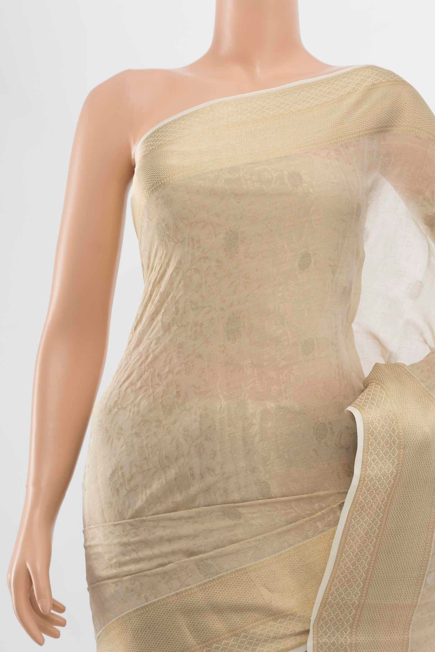 Border image of Off White Georgette Saree with Zari Butta on the body and Silk Border