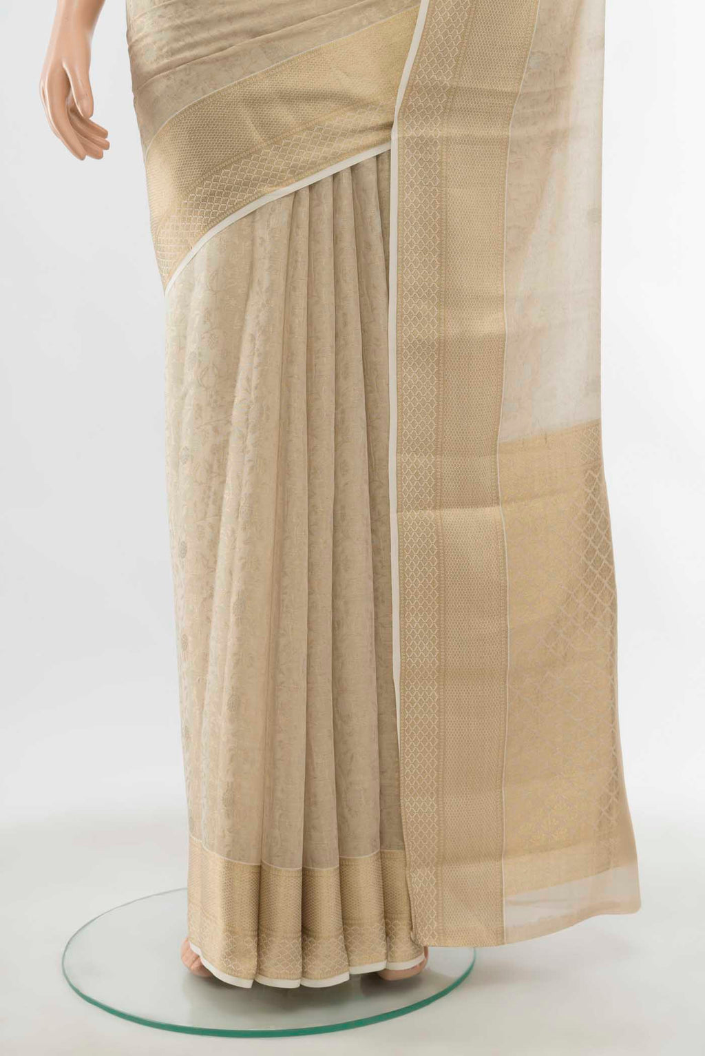 Pleats and pallu of Off White Georgette Saree with Zari Butta on the body and Silk Border