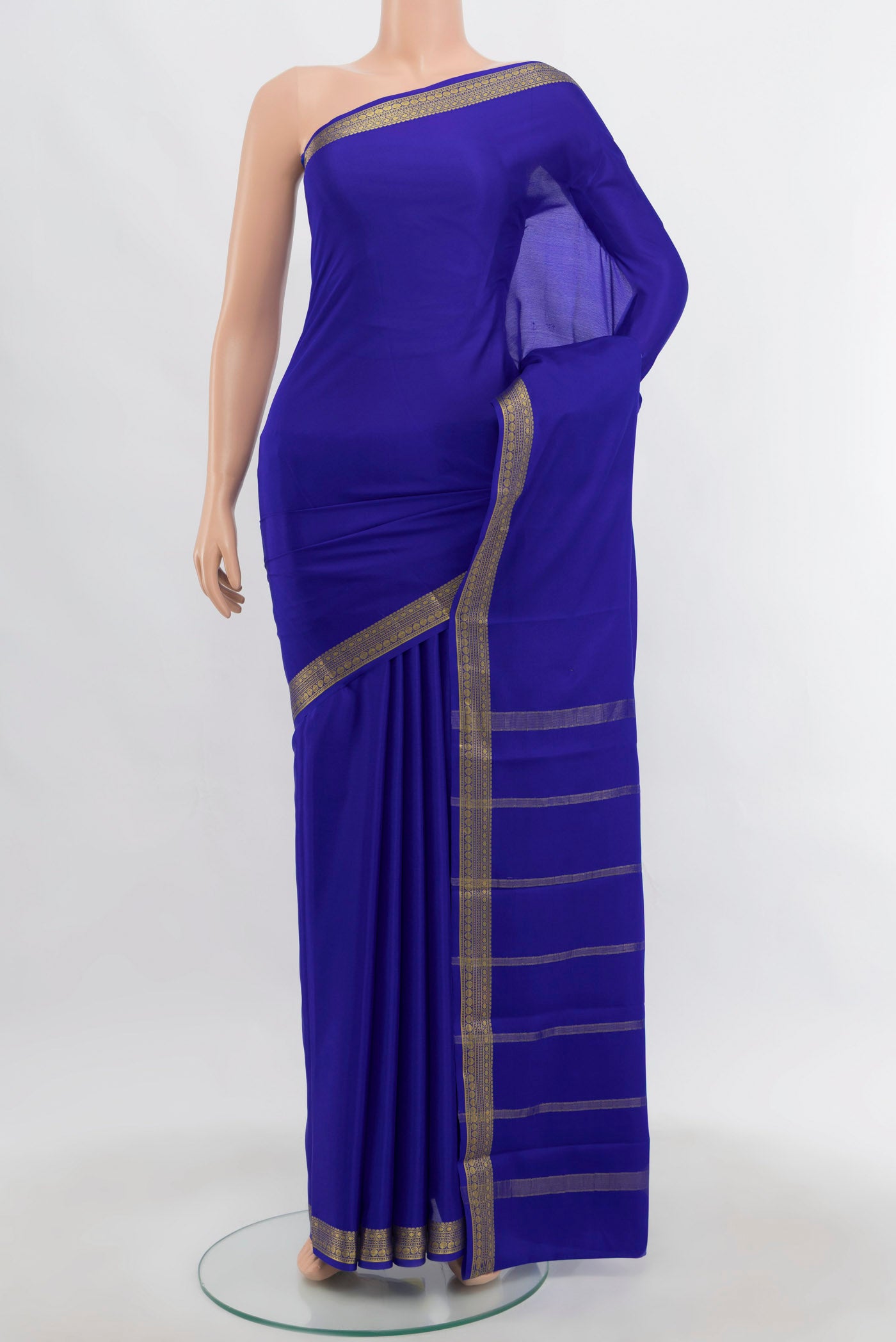 Dark Blue Mysore Crepe Saree with Plain Body and Silk Border.  displayed on a mannequin