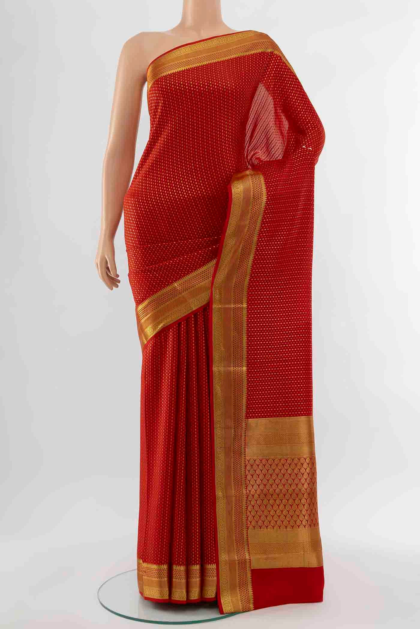 Red Mysore Crepe Saree with Zari Butta on the body and Silk Border displayed on a mannequin