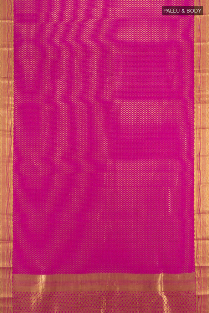 Flat view of Magenta Mysore Crepe Saree with Zari Butta on the body and Silk Border. 