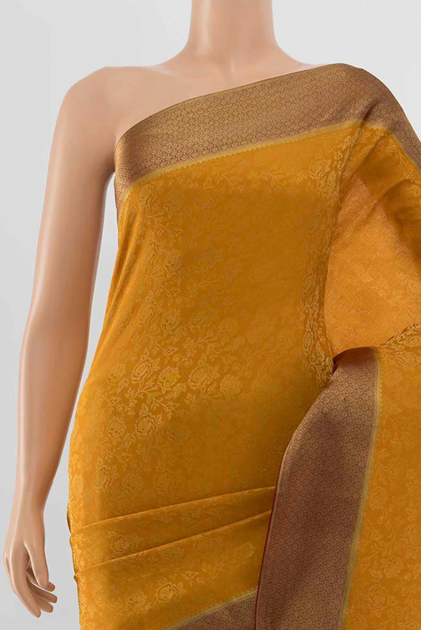Border image of Mustard Mysore Crepe Saree with Zari Butta on the body and Silk Border