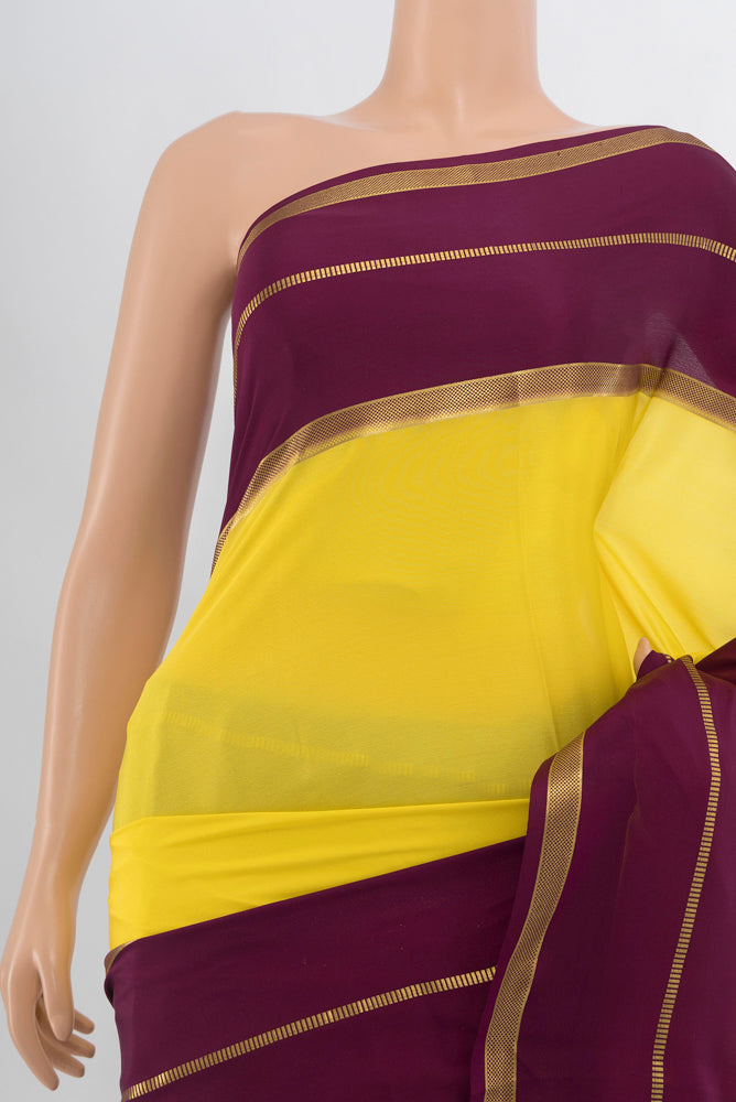 Border image of Lemon Yellow Mysore Crepe Saree with Plain Body and Silk Border. 