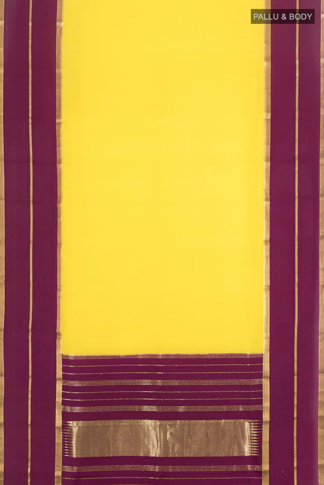 Flat view of Lemon Yellow Mysore Crepe Saree with Plain Body and Silk Border. 
