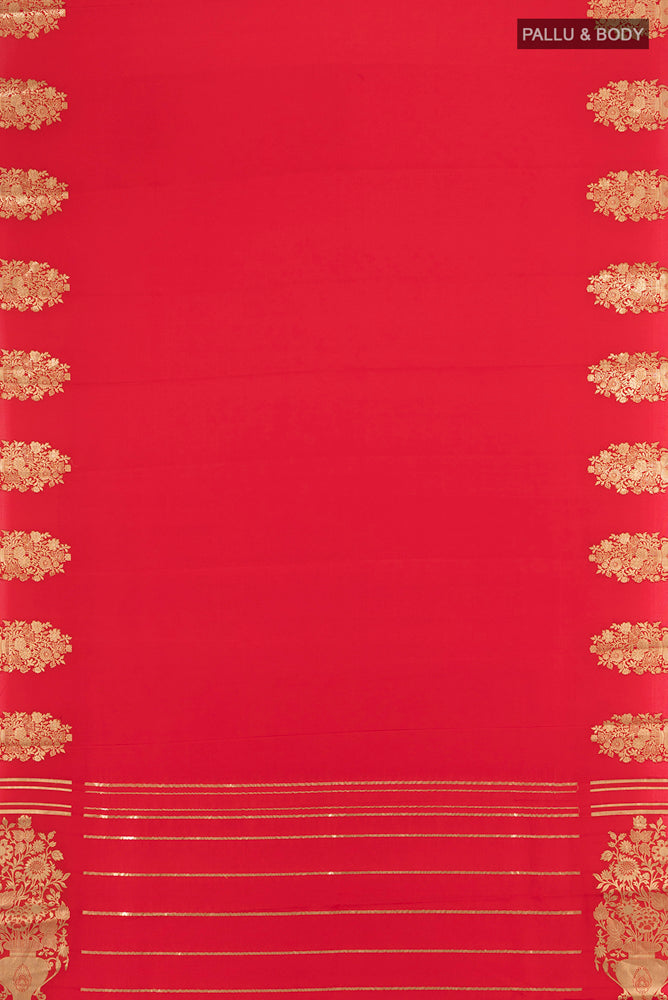 Flat view of Red Mysore Crepe Saree with Zari Butta on the body and Silk Border. 