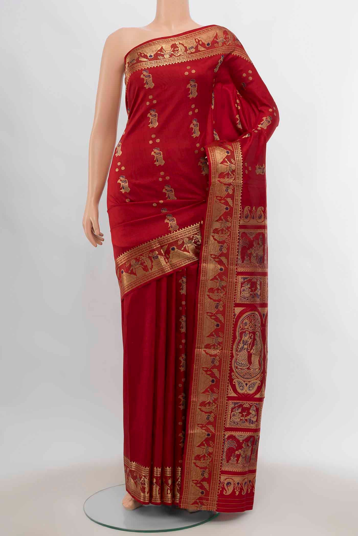 Red Baluchari Silk Saree with Zari And Thread Butta on the body and Zari And Thread Border displayed on a mannequin