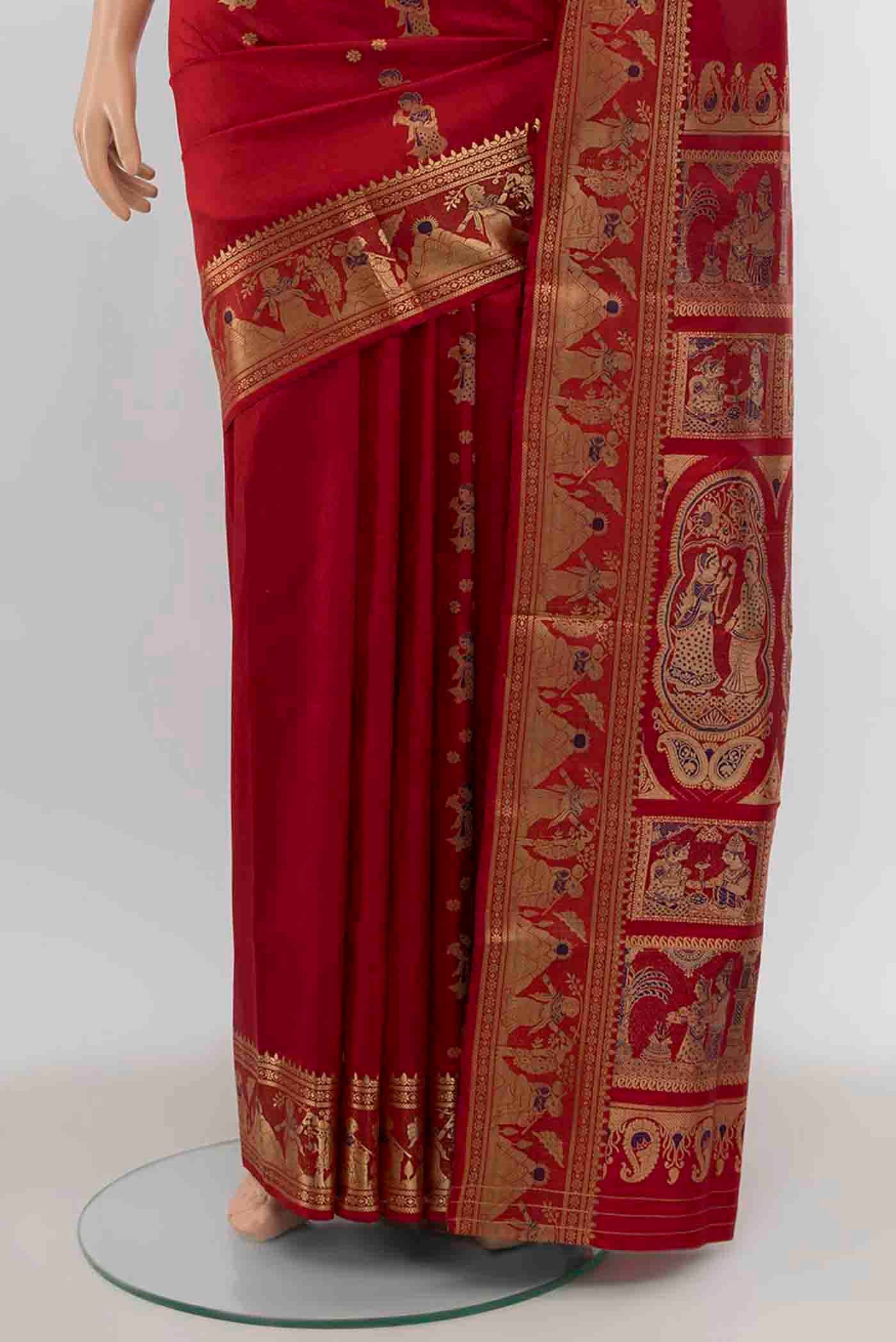 Pleats and pallu of Red Baluchari Silk Saree with Zari And Thread Butta on the body and Zari And Thread Border