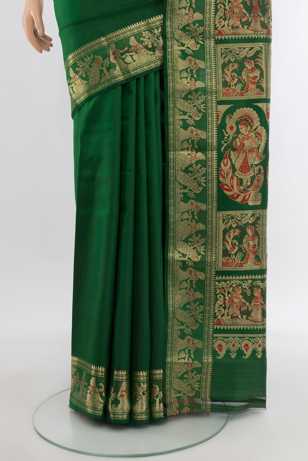 Pleats and pallu of Green Baluchari Silk Saree with Zari And Thread Butta on the body and Zari Border. 