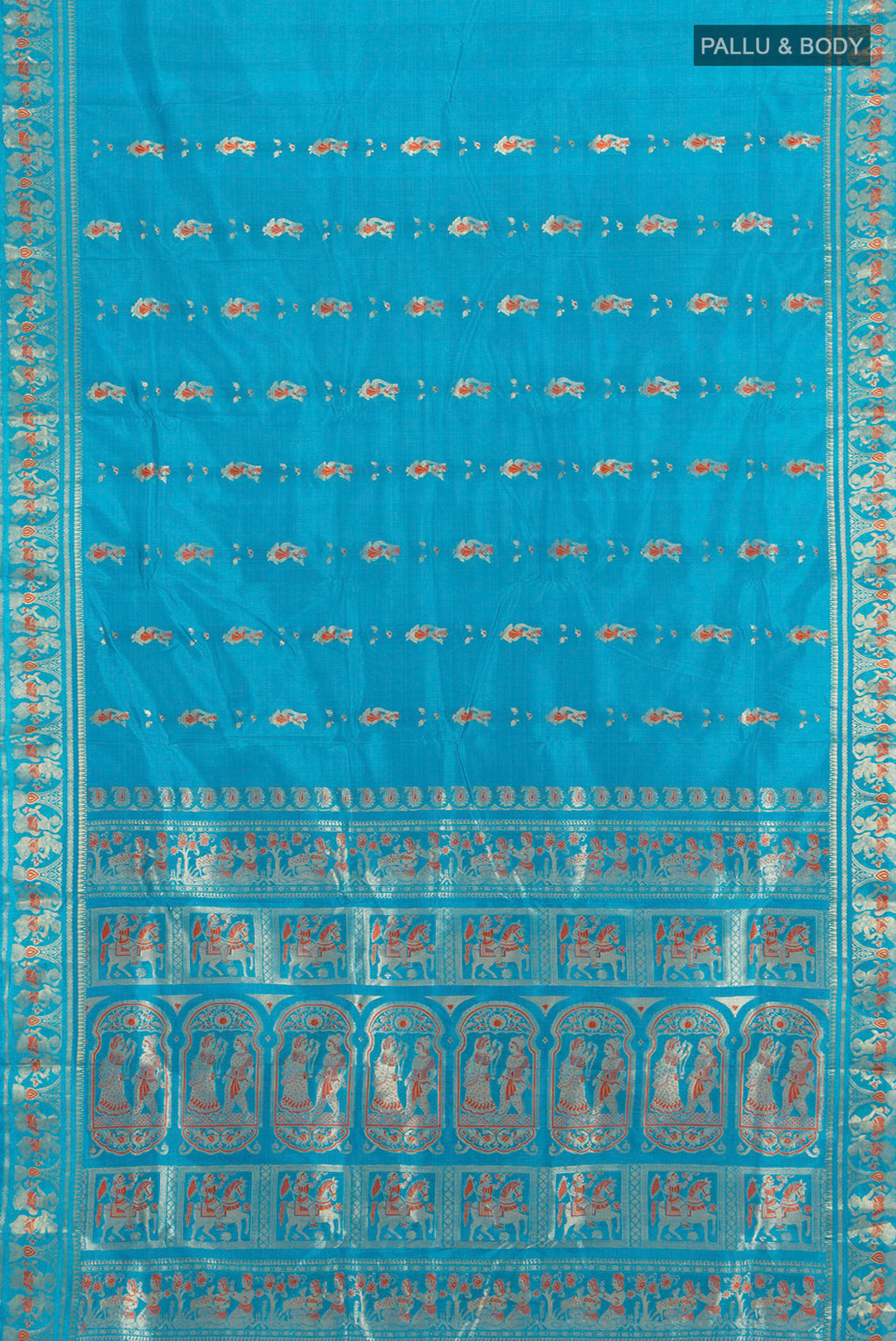 Flat view of Blue Baluchari Silk Saree with Zari And Thread Butta on the body and Zari Border. 