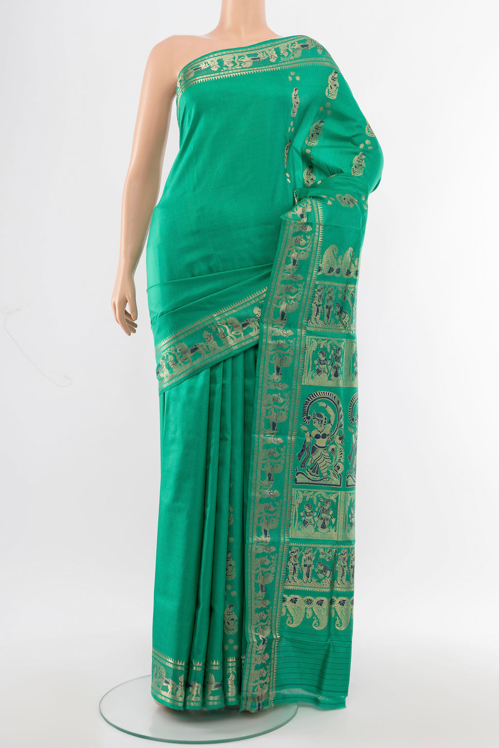 Light Green Baluchari Silk Saree with Zari Butta on the body and Silk Border.  displayed on a mannequin