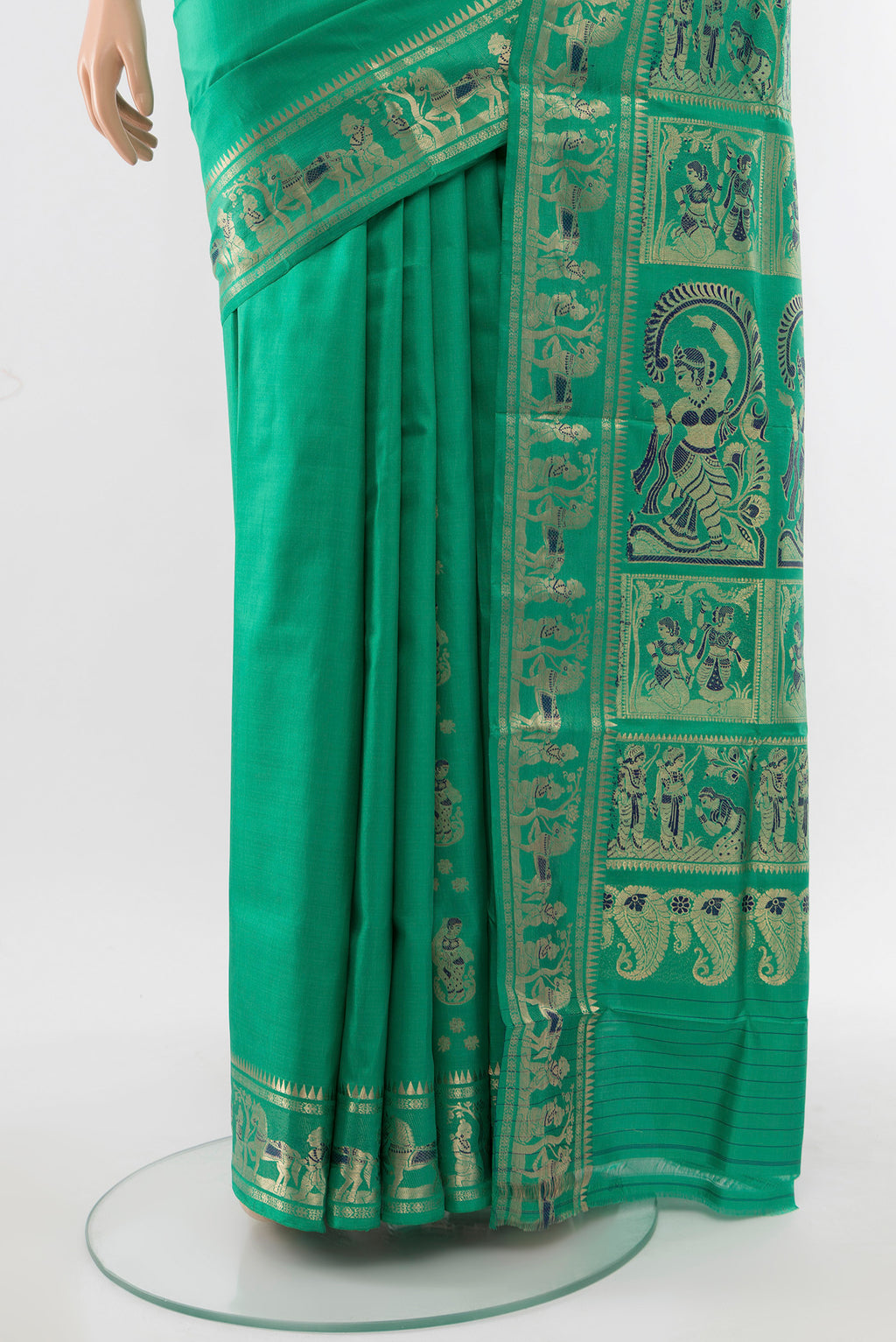 Pleats and pallu of Light Green Baluchari Silk Saree with Zari Butta on the body and Silk Border. 