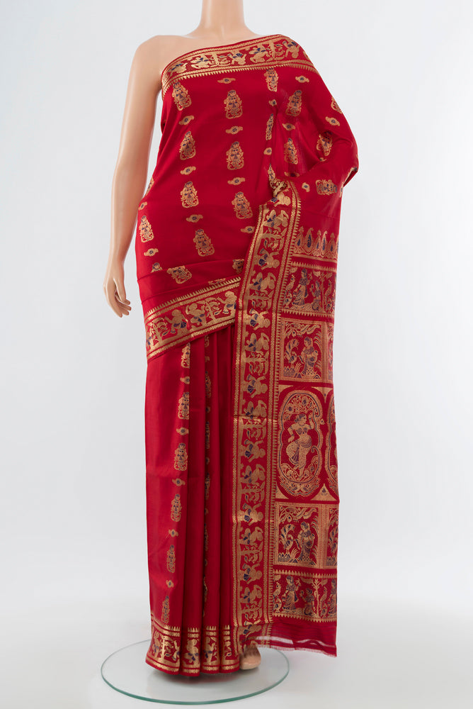 Red Baluchari Silk Saree with Zari Butta on the body and Silk Border.  displayed on a mannequin