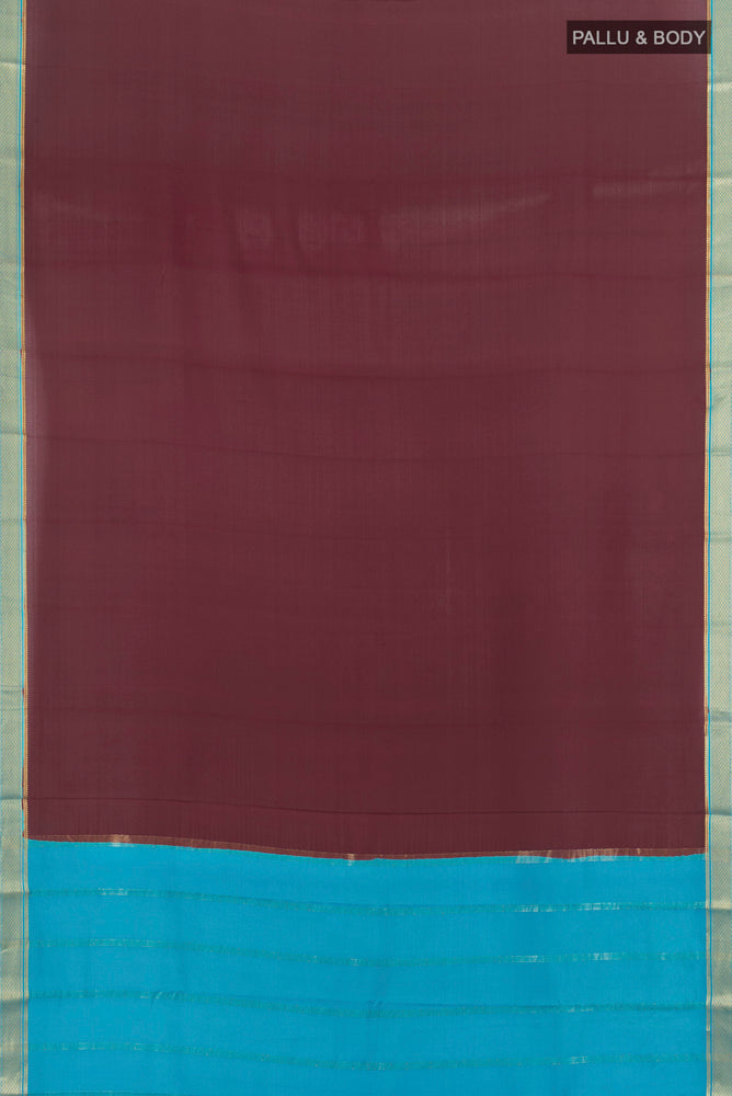 Flat view of Pure Silk Pure Zari Coffee Brown Mysore Crepe Saree with Zari Butta on the body and Silk Border. 