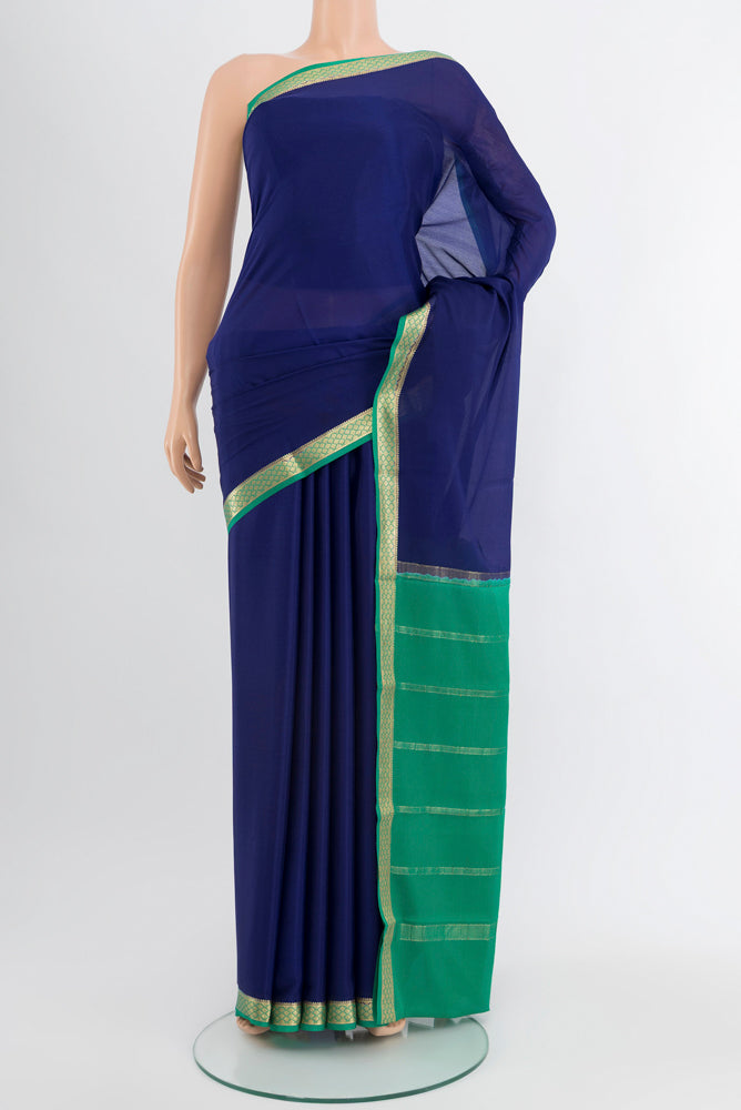 Dark Blue Mysore Crepe Saree with Plain Body and Silk Border.  displayed on a mannequin