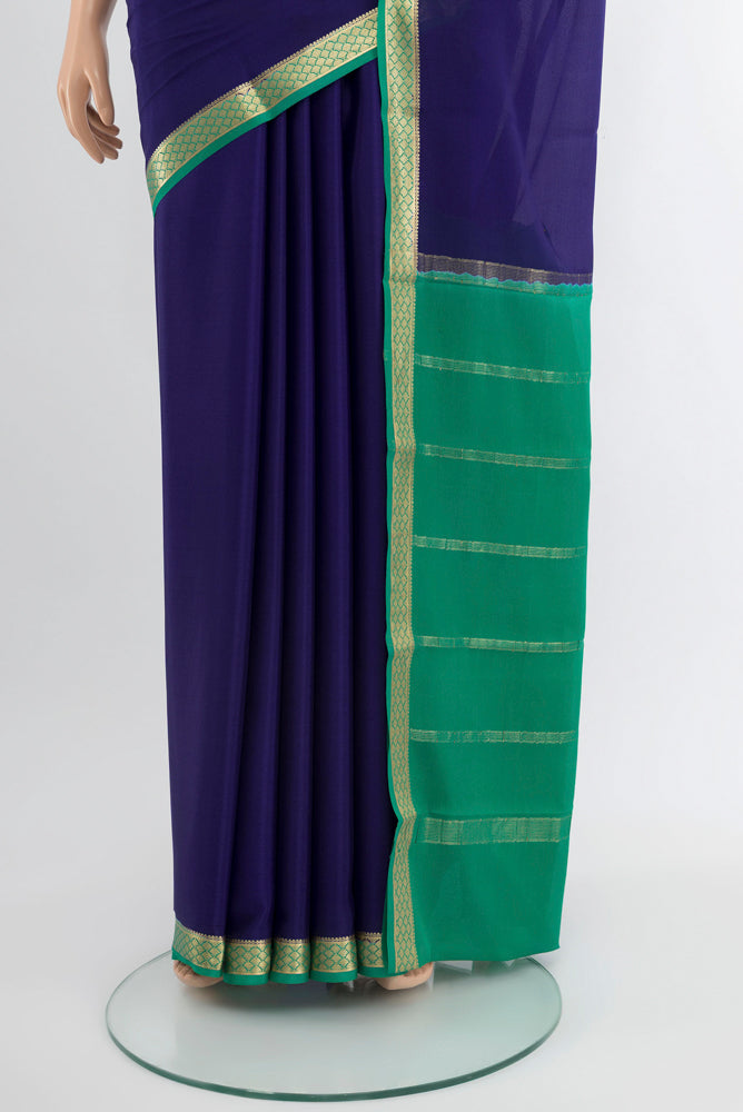 Pleats and pallu of Dark Blue Mysore Crepe Saree with Plain Body and Silk Border. 