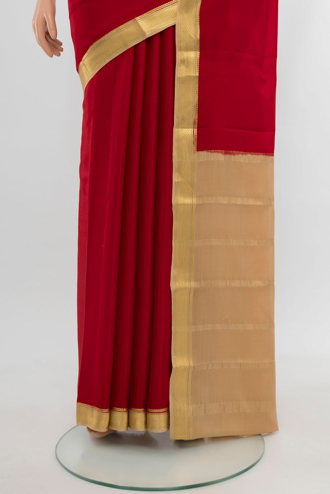 Pleats and pallu of Red Mysore Crepe Saree with Plain Body and Silk Border. 