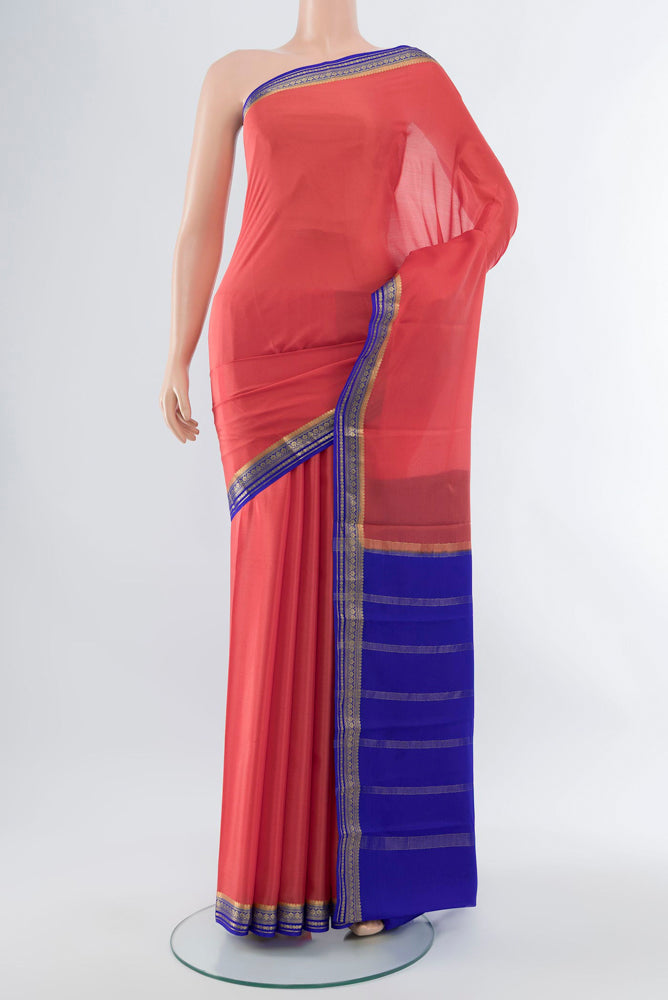 Rose pink Mysore Crepe Saree with Plain Body and Silk Border.  displayed on a mannequin