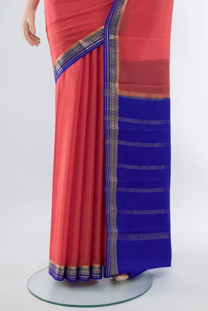 Pleats and pallu of Rose pink Mysore Crepe Saree with Plain Body and Silk Border. 