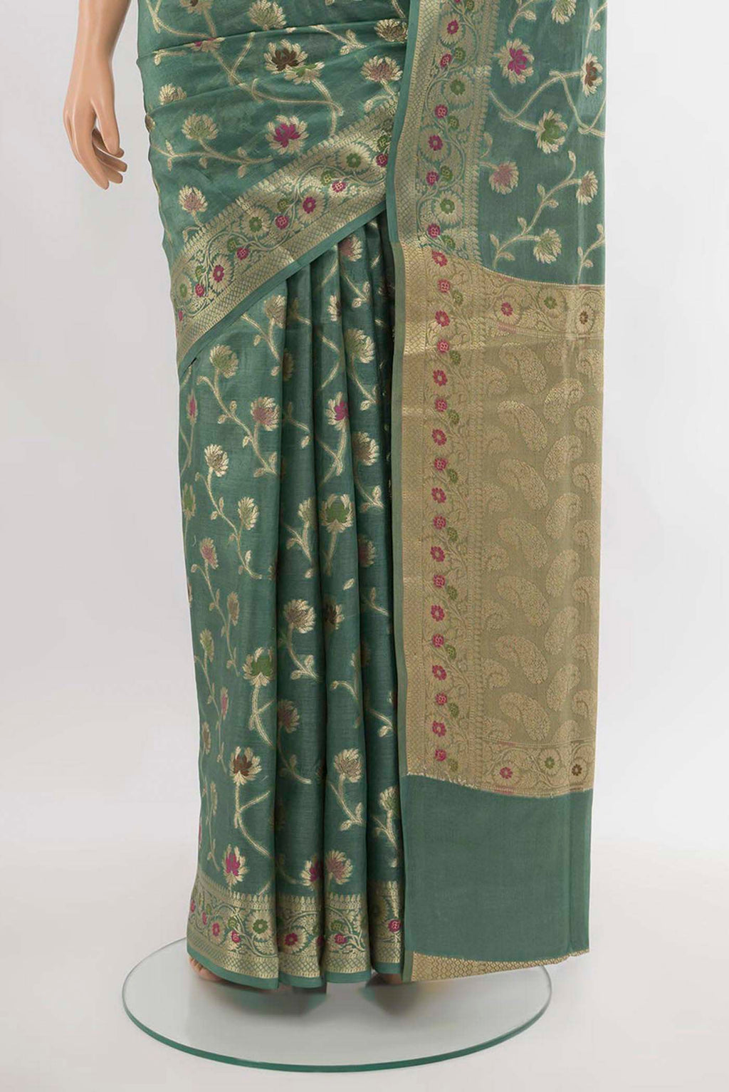 Pleats and pallu of Light Green Banarasi Raw Silk Saree with Zari Butta on the body and Silk Border. 