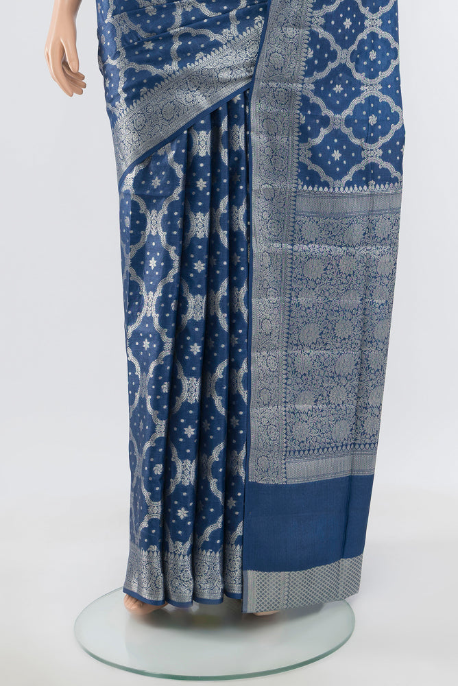 Pleats and pallu of Pure Silk Pure Zari Light Blue Banarasi Raw Saree with Zari Butta on the body and Silk Border. 