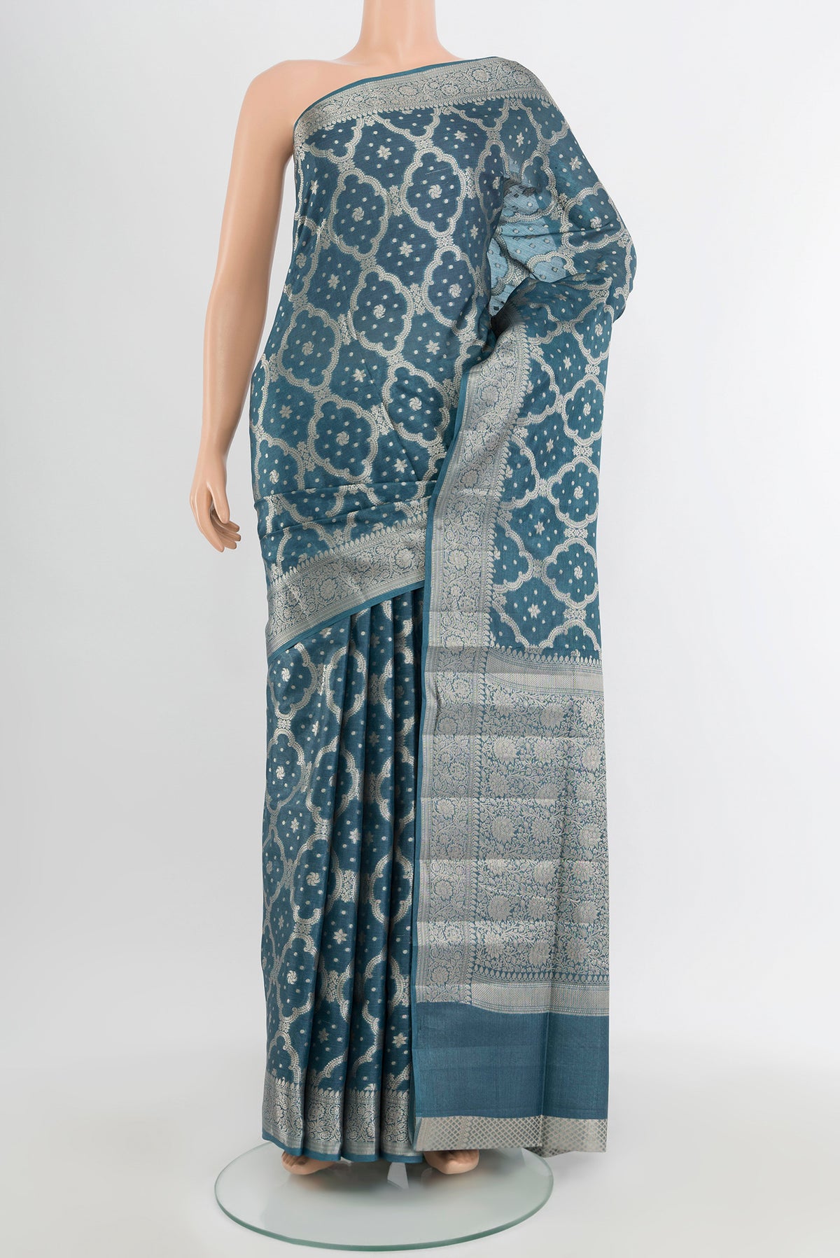 Davys Grey Banarasi Raw Silk Saree with Zari Butta on the body and Silk Border.  displayed on a mannequin