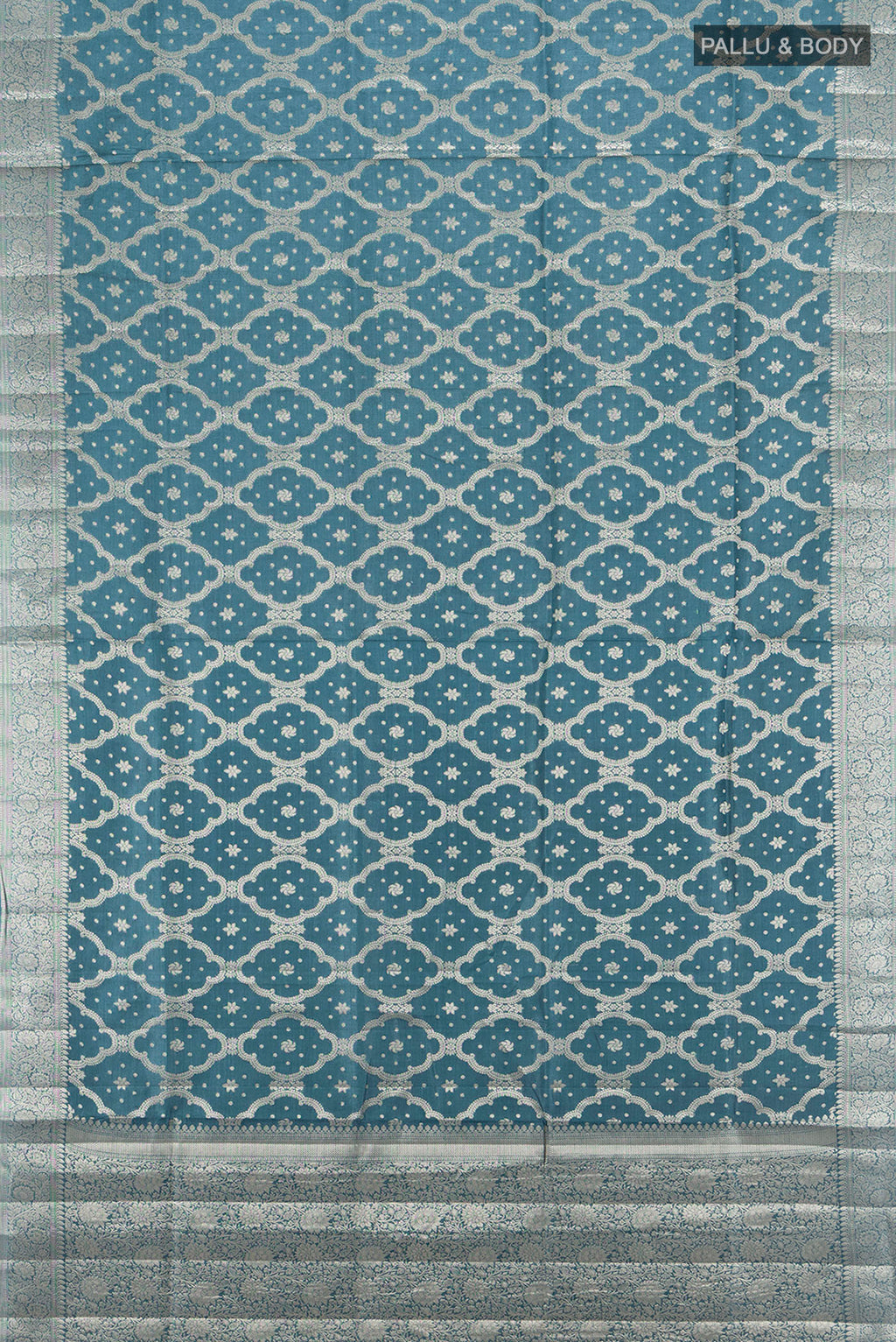 Flat view of Davys Grey Banarasi Raw Silk Saree with Zari Butta on the body and Silk Border. 