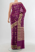 Purple Banarasi Tussar Silk Saree with Zari And Thread Butta on the body and Zari Border.  displayed on a mannequin