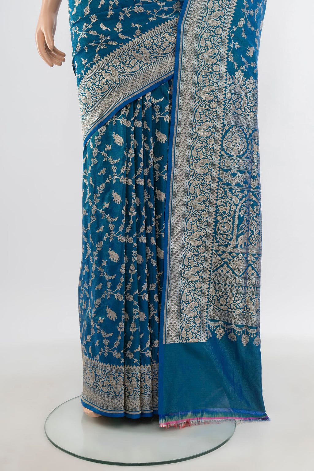Pleats and pallu of Peacock Blue Banarasi Silk Saree with Zari Brocade on the body and Zari Border. 