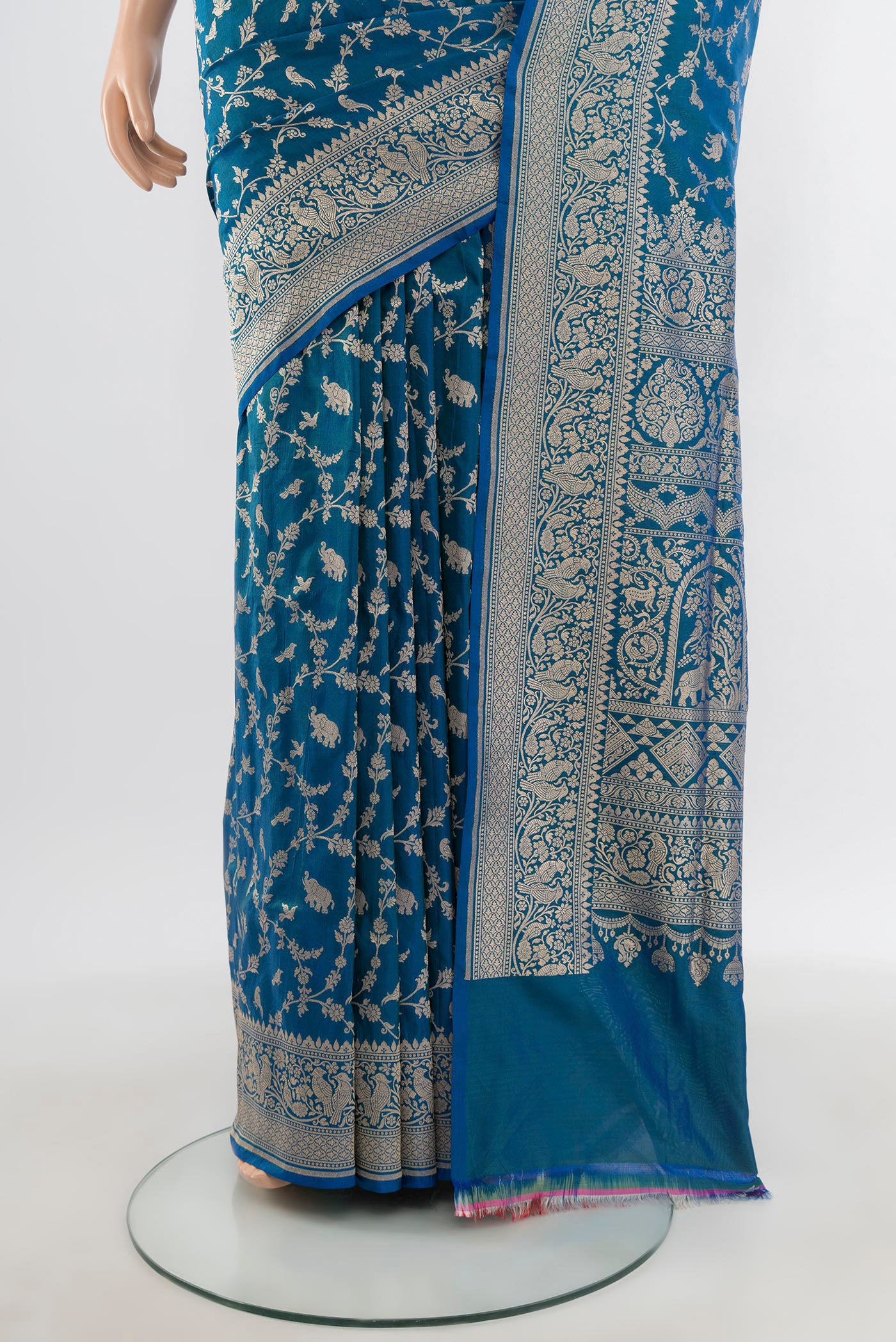 Pleats and pallu of Peacock Blue Banarasi Silk Saree with Zari Brocade on the body and Zari Border. 