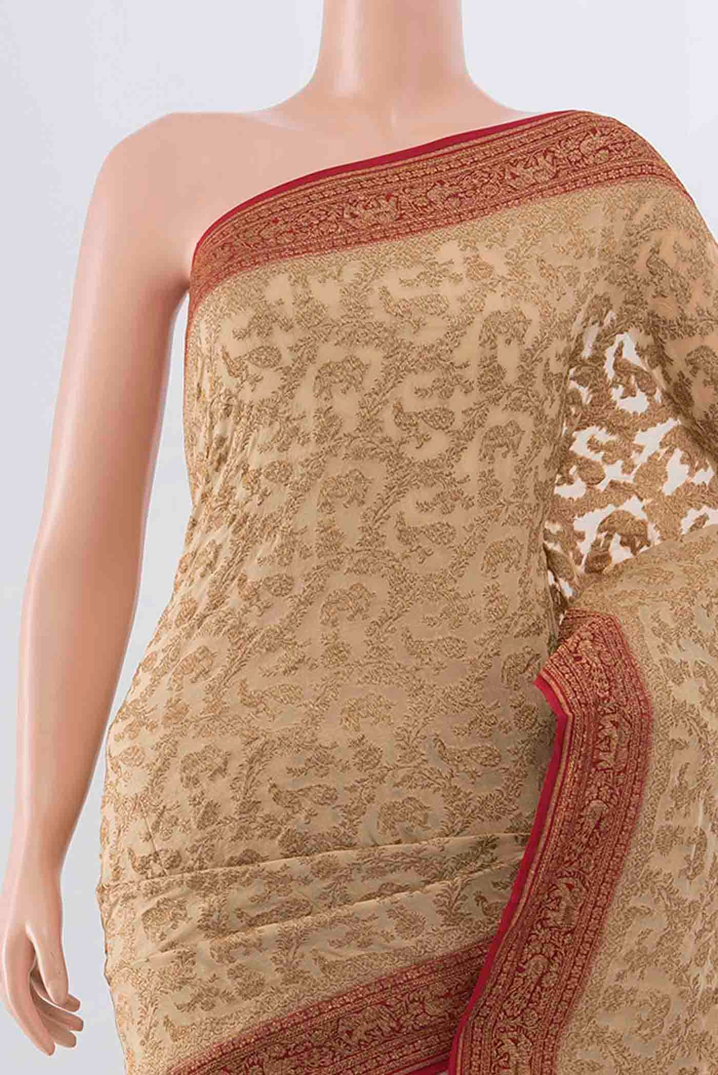 Border image of Beige Banarasi Georgette Saree with Zari Brocade on the body and Zari Border