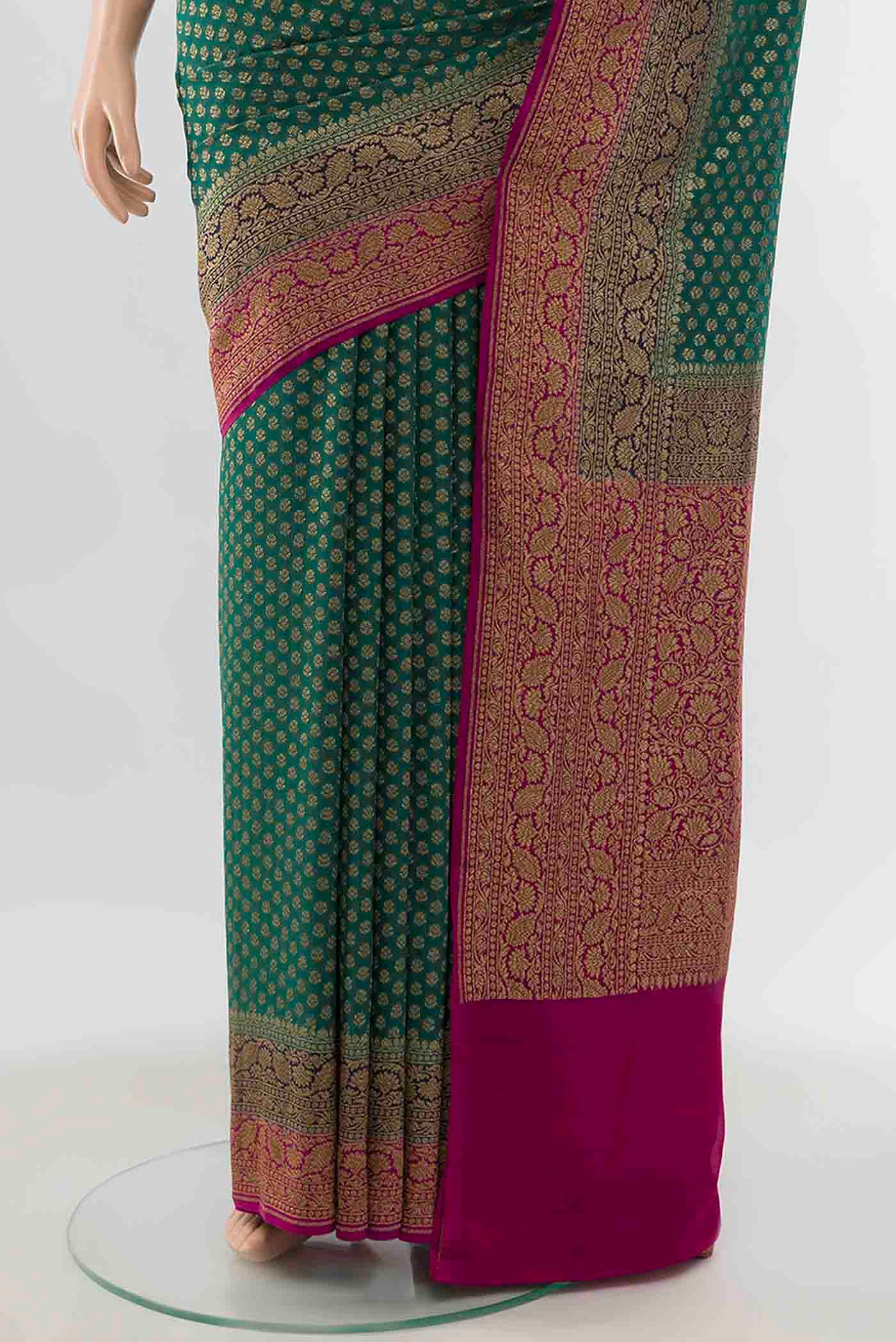 Pleats and pallu of Blue Banarasi Georgette Saree with Zari Brocade on the body and Zari Border