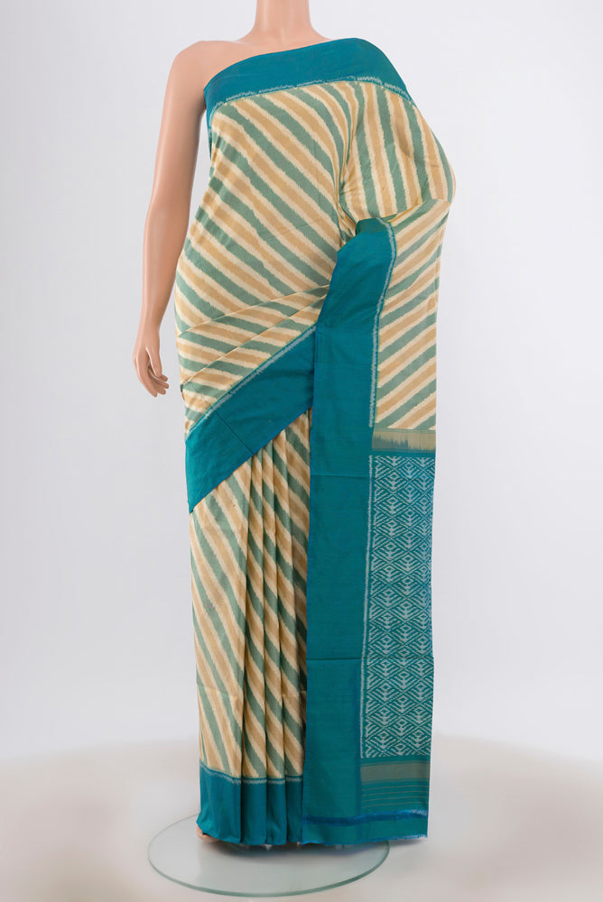 Multi Color Pochampally Saree with Ikat Print on the body and Silk Border.  displayed on a mannequin