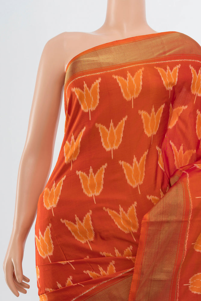 Border image of Brick Orange Pochampally Saree with Ikat Print on the body and Silk Border. 