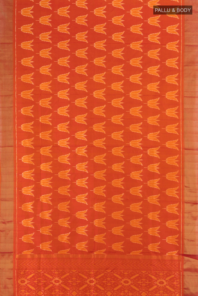 Flat view of Brick Orange Pochampally Saree with Ikat Print on the body and Silk Border. 