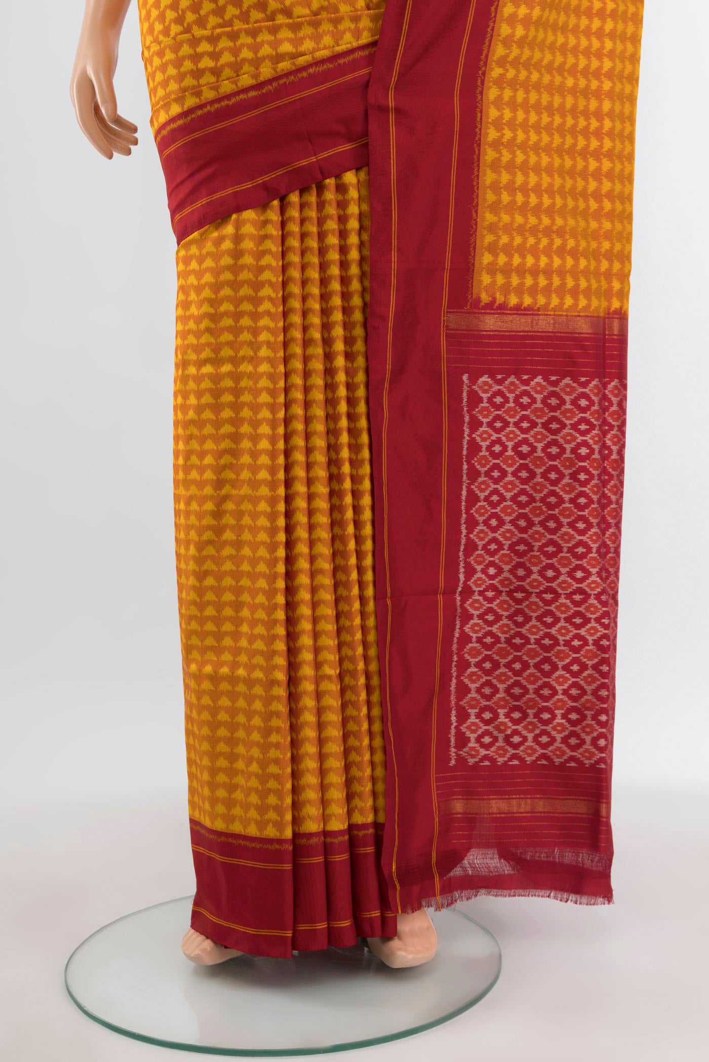 Pleats and pallu of Mustard Pochampally Silk Saree with Pure Ikat on the body and Plain Border. 