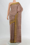 Mauve Pochampally Silk Saree with Pure Ikat on the body and Zari Border.  displayed on a mannequin