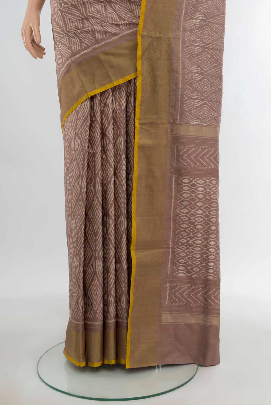 Pleats and pallu of Mauve Pochampally Silk Saree with Pure Ikat on the body and Zari Border. 