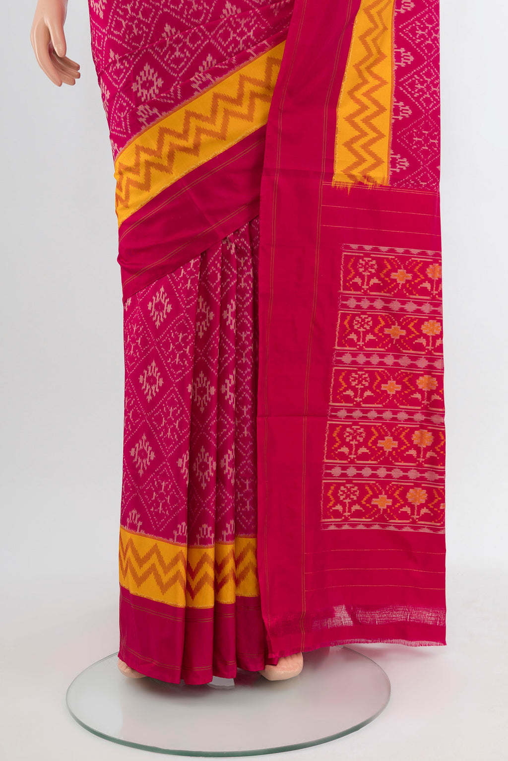 Pleats and pallu of Dark Pink Pochampally Saree with Ikat Print on the body and Silk Border. 