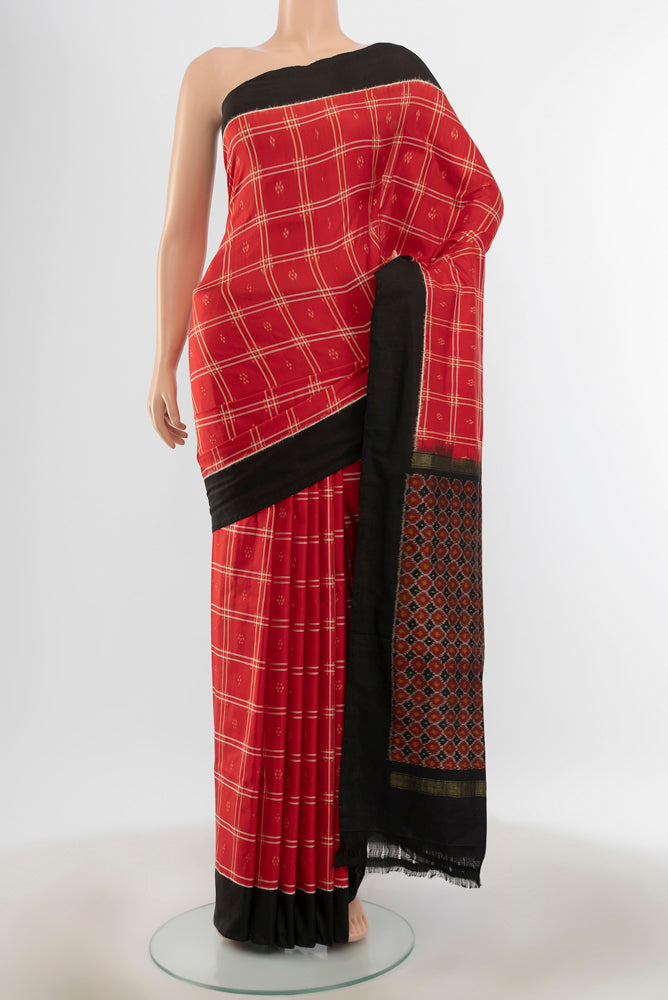 Pure Silk Pure Zari Red Pochampally Saree with Ikat Print on the body and Silk Border.  displayed on a mannequin